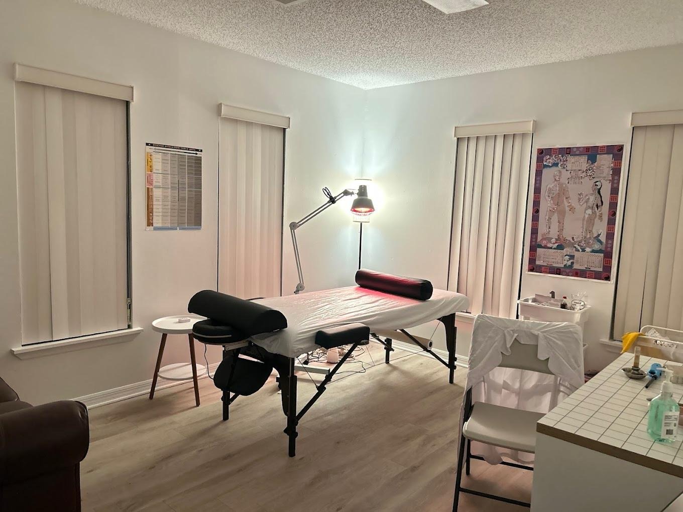 Acupuncture treatment room prepared for first-time patient visit