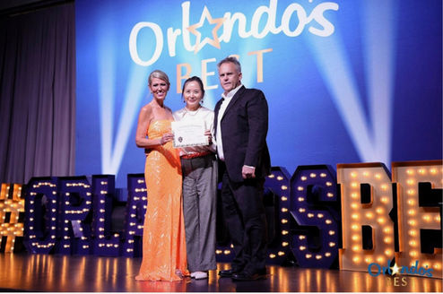Dr. Yi at the Orlando's Best 2024 award ceremony