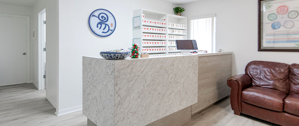 Yi Acupuncture clinic reception area with traditional Chinese decor in Altamonte Springs