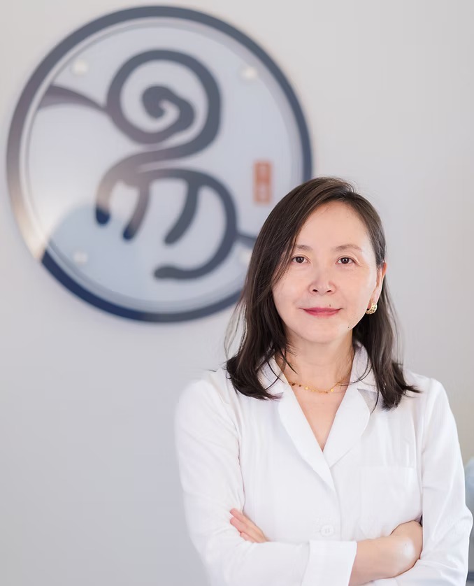 Dr. Qing Yi, Licensed Acupuncturist, professional portrait at Yi Acupuncture clinic