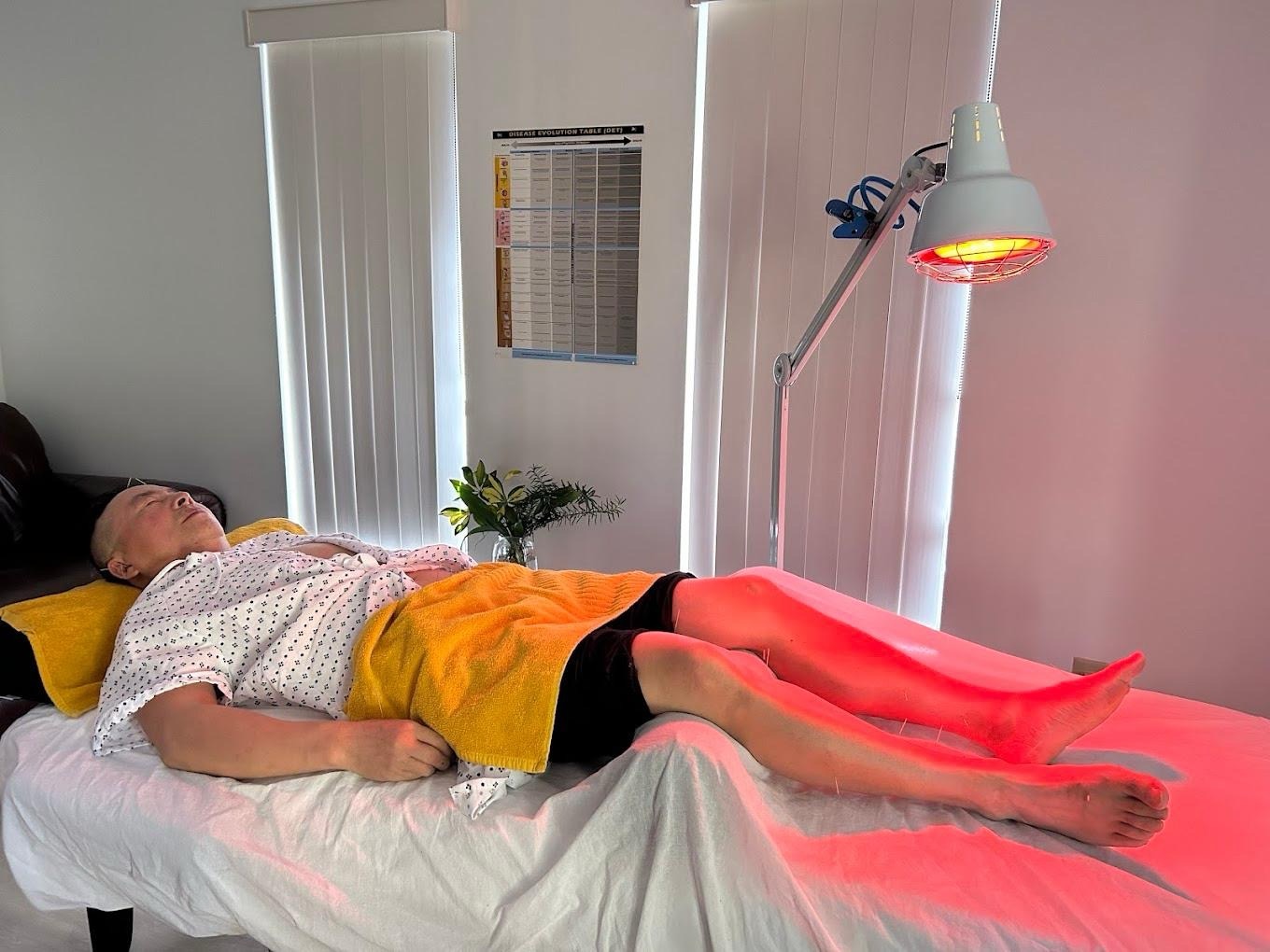 Community acupuncture treatment session for accessible holistic care